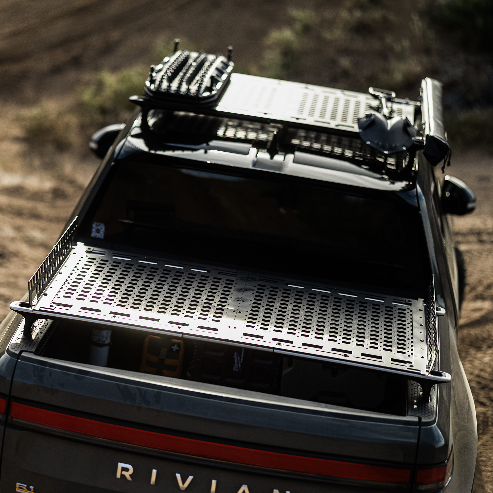 Rivian car equipped with off-road accessories, perfect for outdoor adventures and camping
