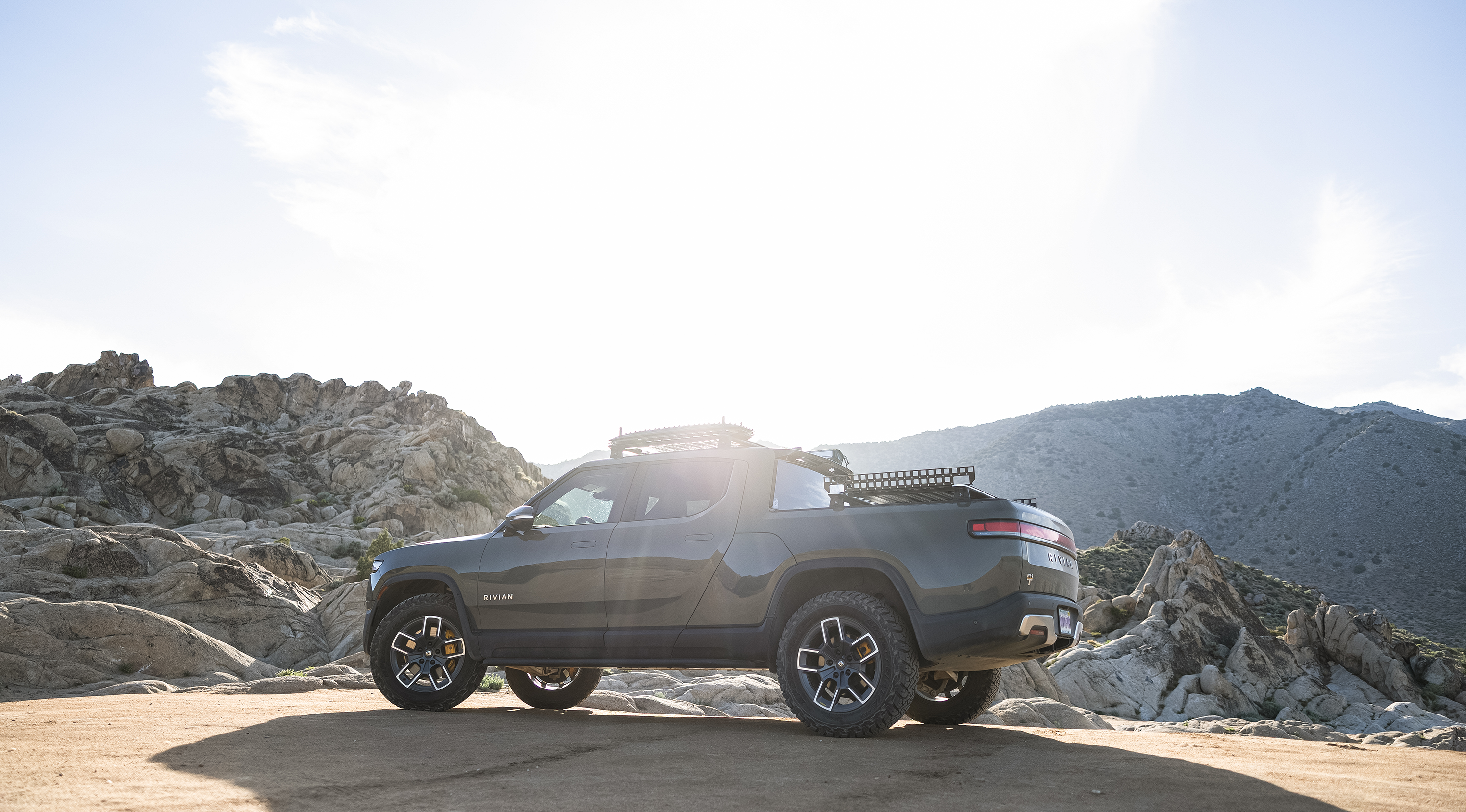 Rivian truck featuring Overland Nomadic's camping and overlanding gear for rugged journeys